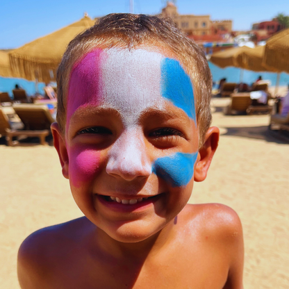 Child with colorful zinc sunscreen from rays and rocks