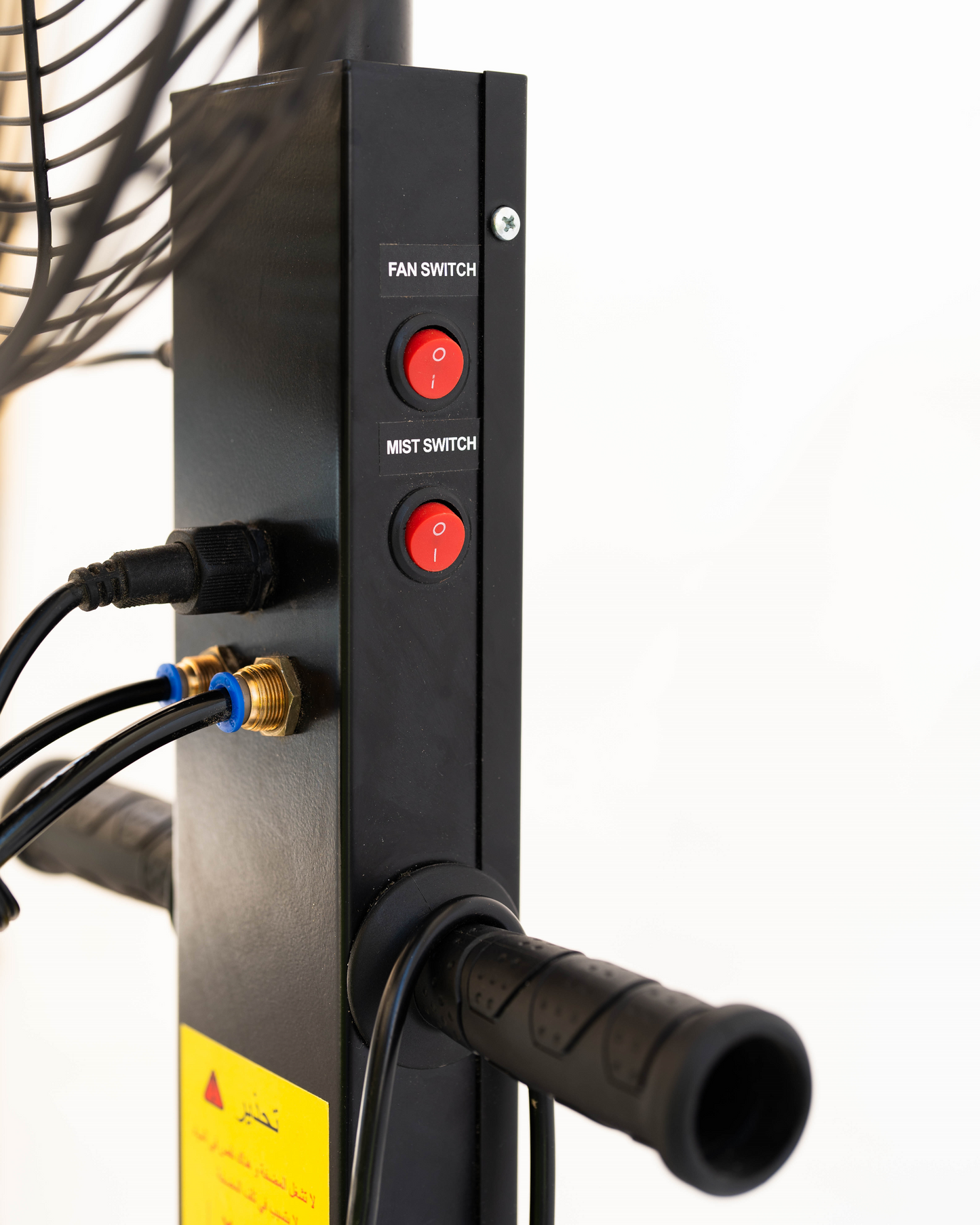 Control panel with red switches and black cables on a white background